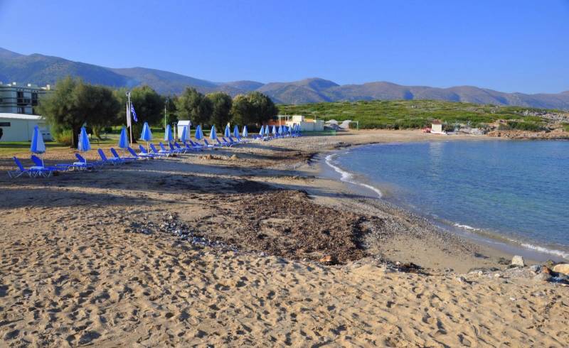 Photo of Agia Varvara beach with brown sand surface