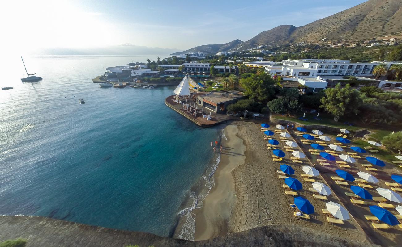 Photo of Elounda Bay with bright fine sand surface