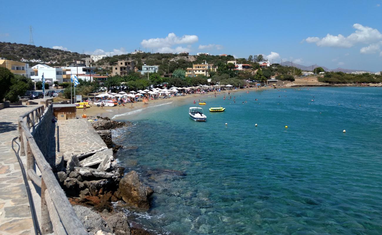 Photo of Paralia Ammoudara with brown sand surface