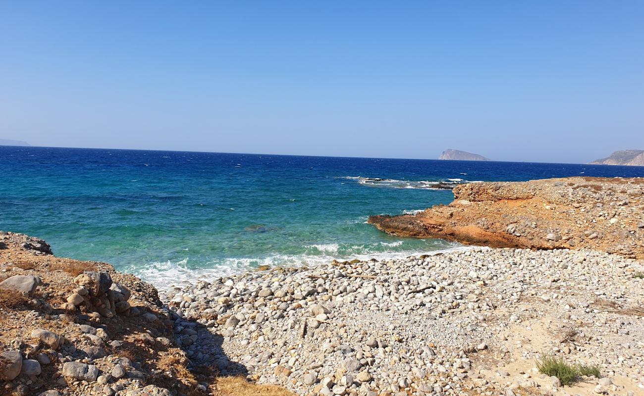 Photo of Kamini beach with rocks cover surface