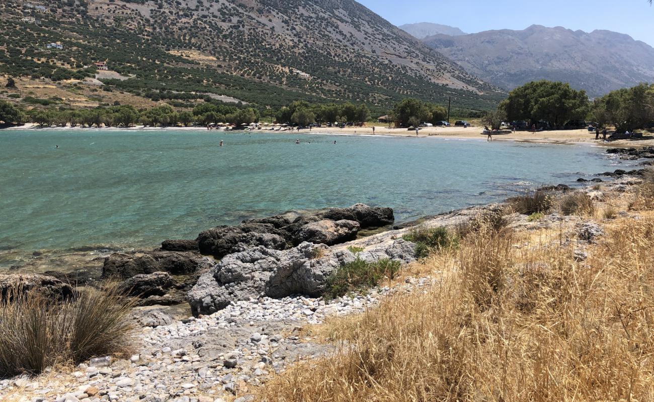 Photo of Paralia Tholou with brown sand surface