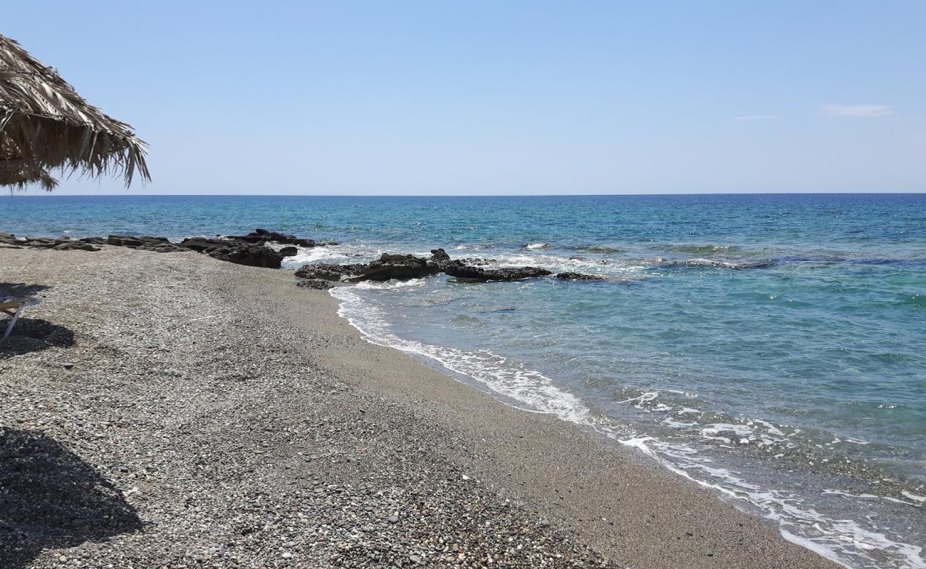 Photo of Koutsoureli beach with gray sand &  pebble surface