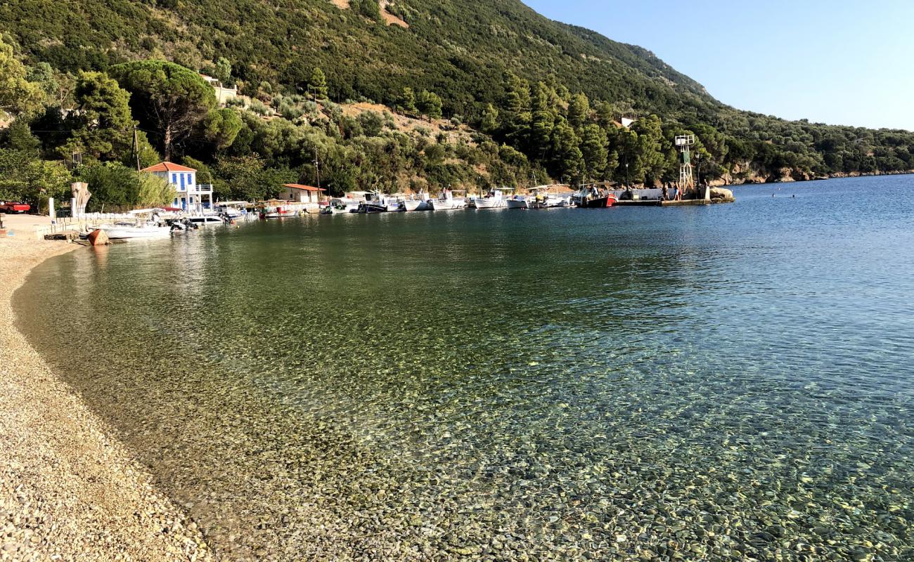 Photo of Pólis beach with light pebble surface