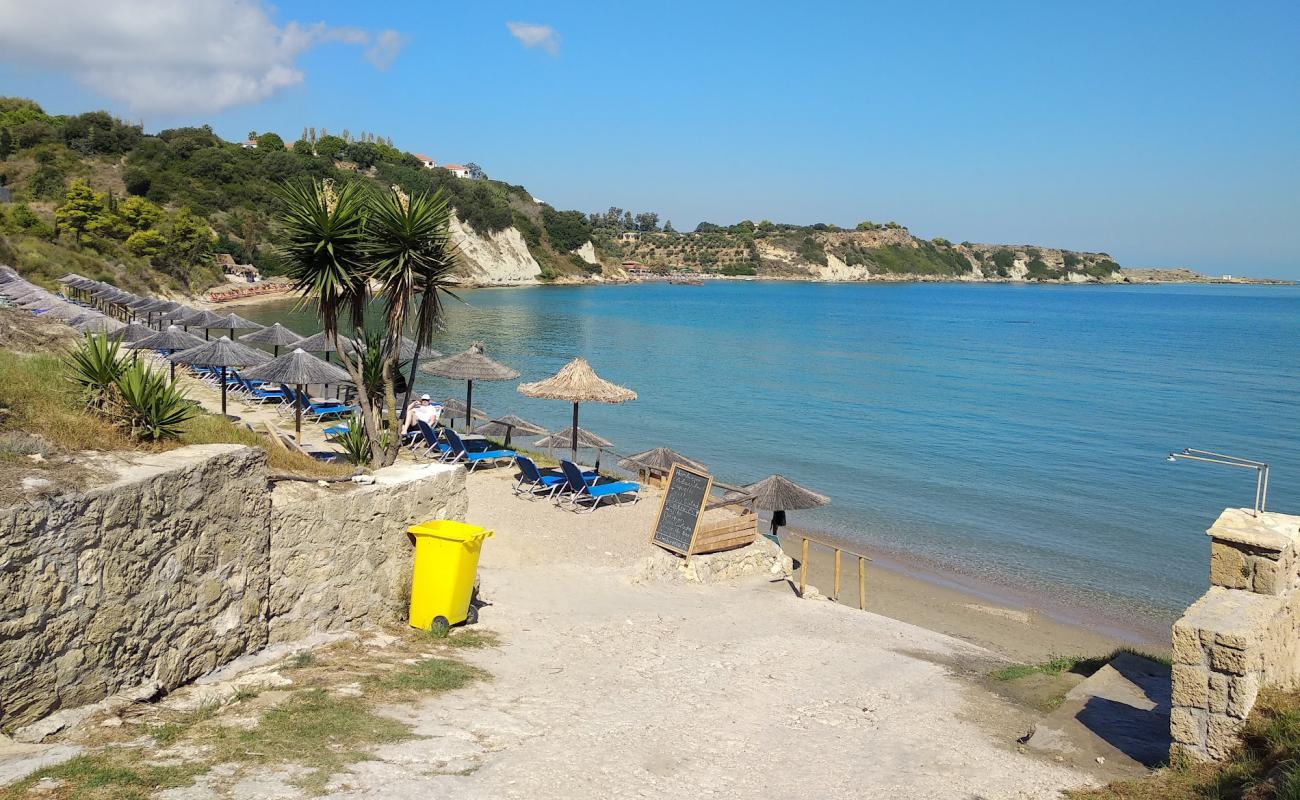 Photo of Porto Roma Beach with bright sand surface