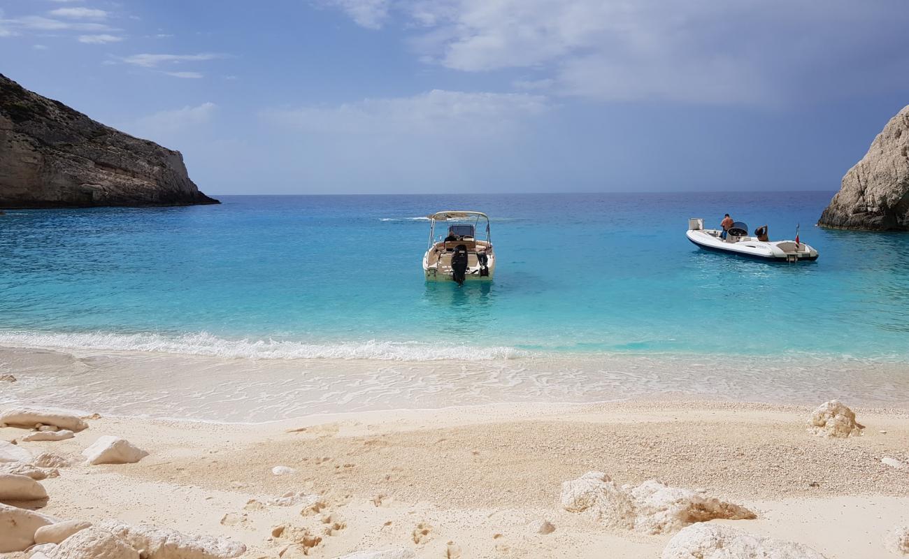 Photo of White Beach with light fine pebble surface