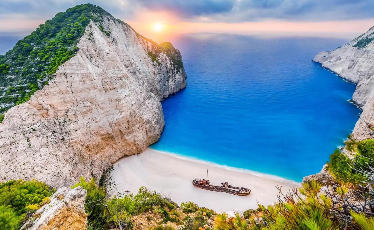 Photo of Navagio Beach (Shipwreak) with light fine pebble surface