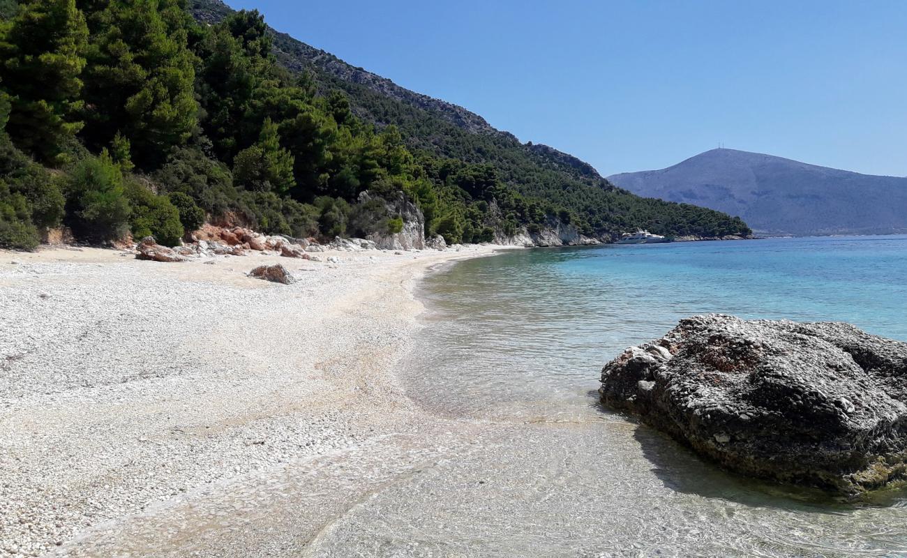 Photo of Mirtia Beach with light sand &  pebble surface