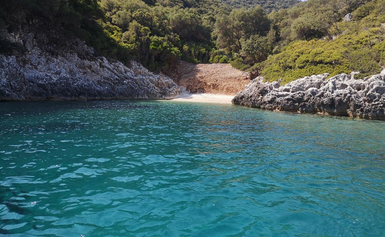 Photo of Little beach with light fine pebble surface