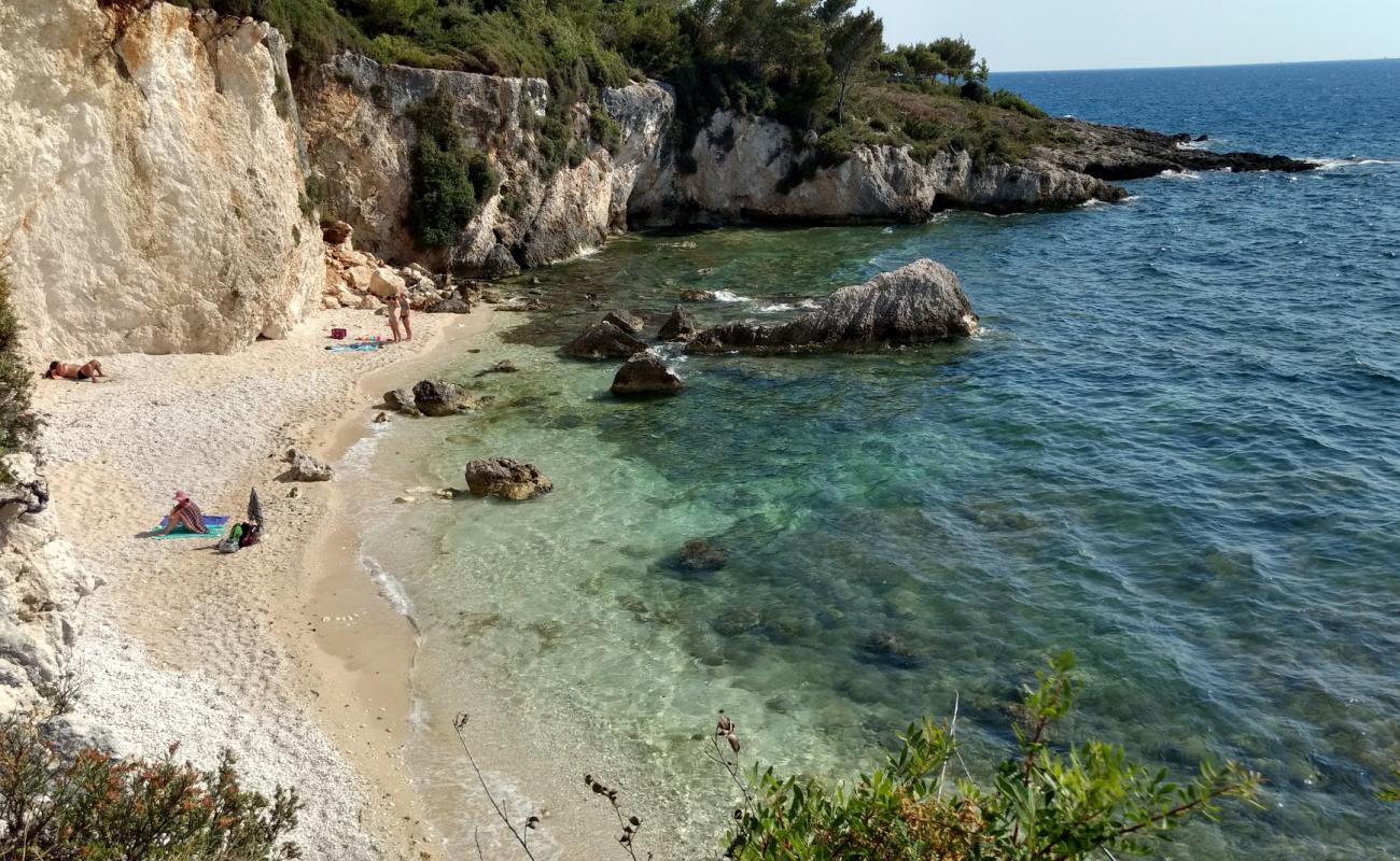 Photo of Crocodile beach with light pebble surface