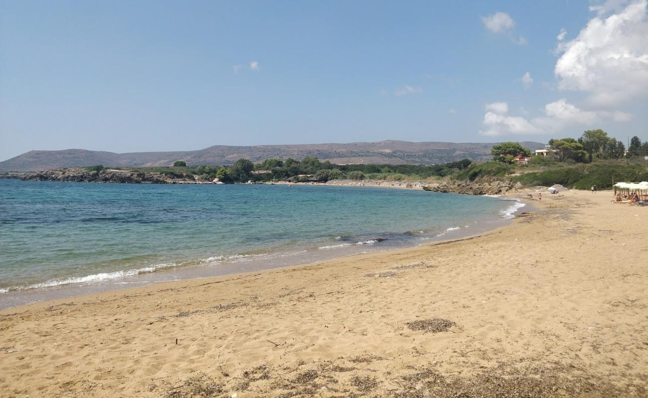 Photo of Vrachinari beach with brown sand surface