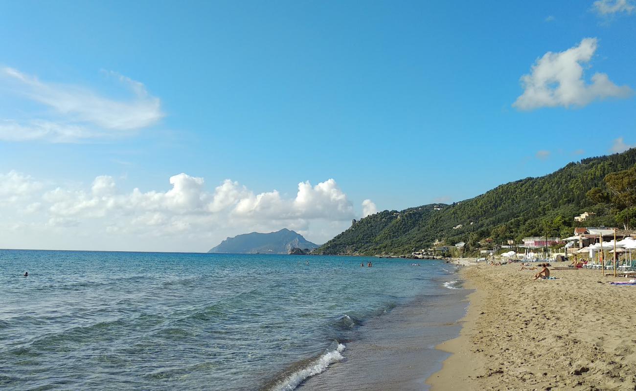 Photo of Agios Gordios beach with bright fine sand surface