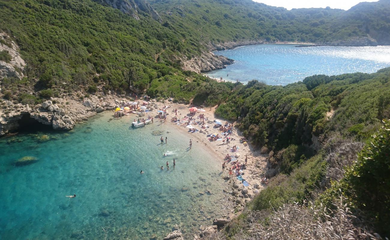 Photo of Porto Timoni with light sand &  pebble surface