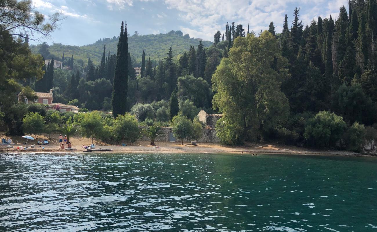 Photo of Chouchoulio Beach with brown fine pebble surface