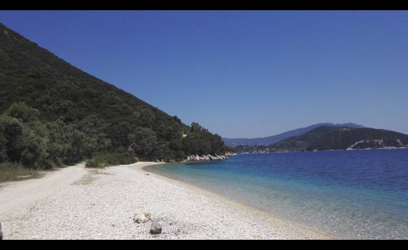 Photo of Kamari Beach with light pebble surface