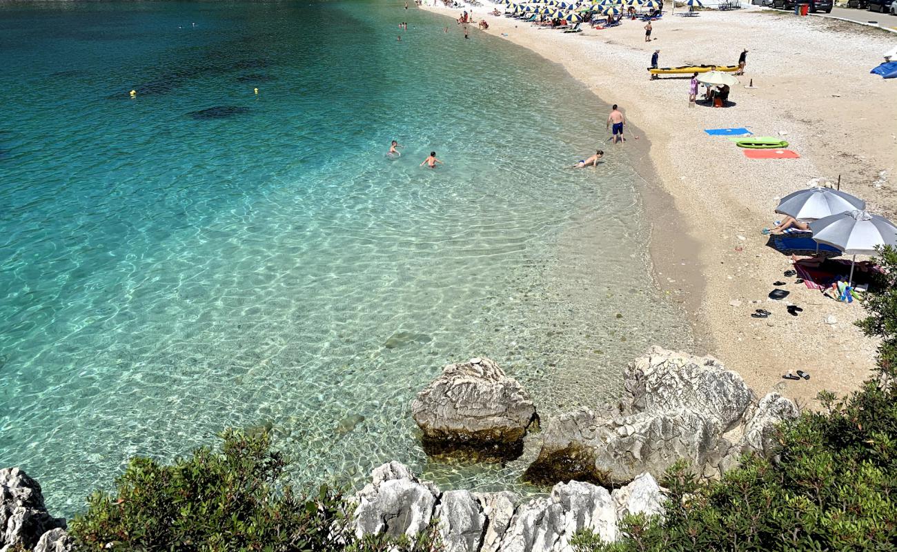 Photo of Mikros Gialos beach with gray fine pebble surface