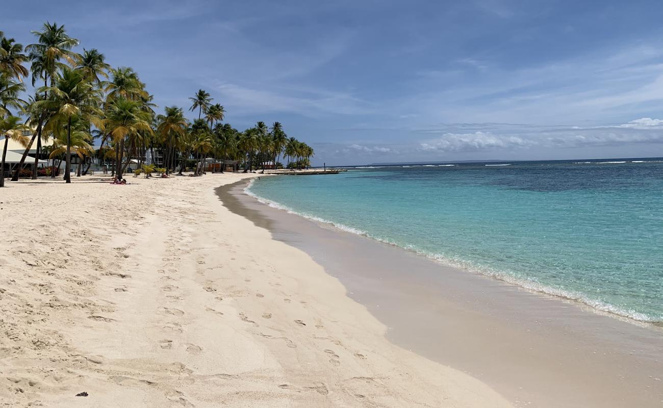 Photo of The Beach of Caravelle with bright fine sand surface