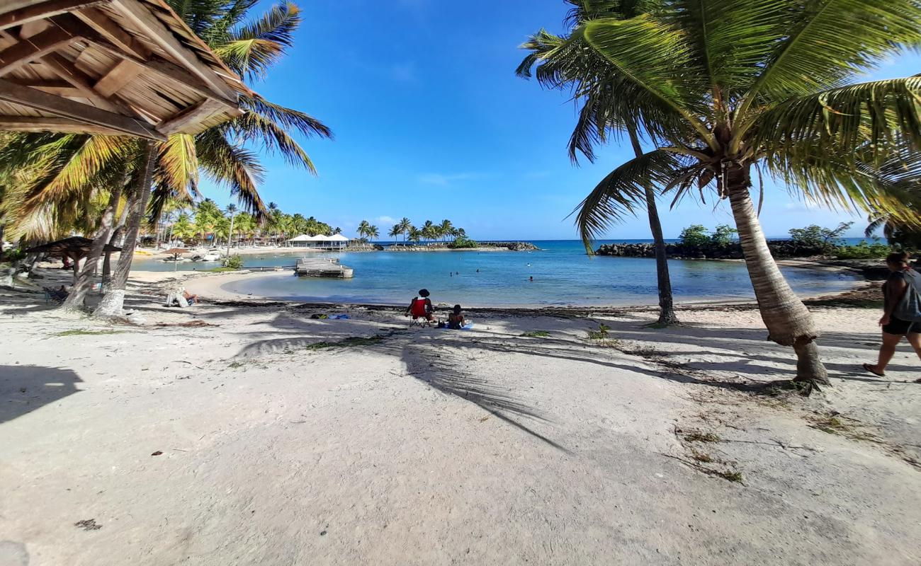 Photo of Plage de Bas du Fort with bright fine sand surface