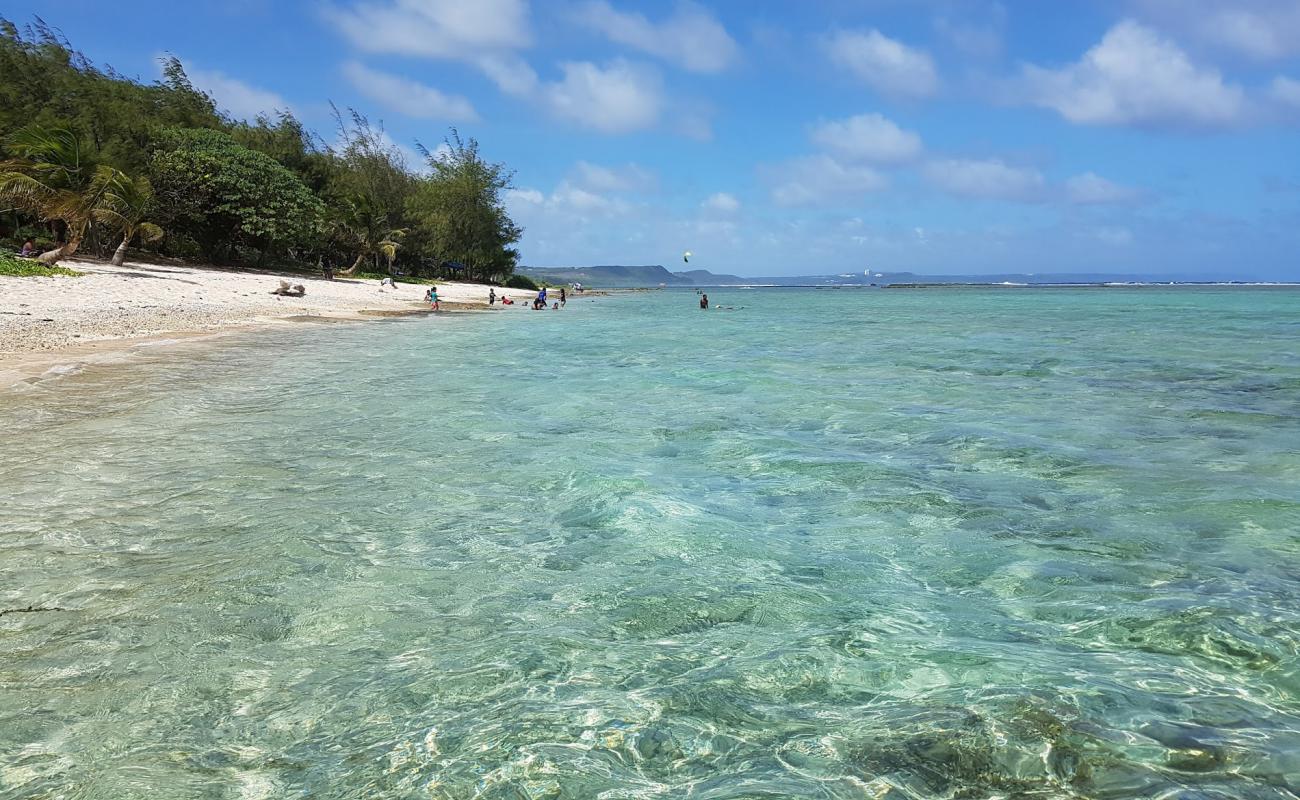 Photo of Ipan Beach with light sand &  pebble surface