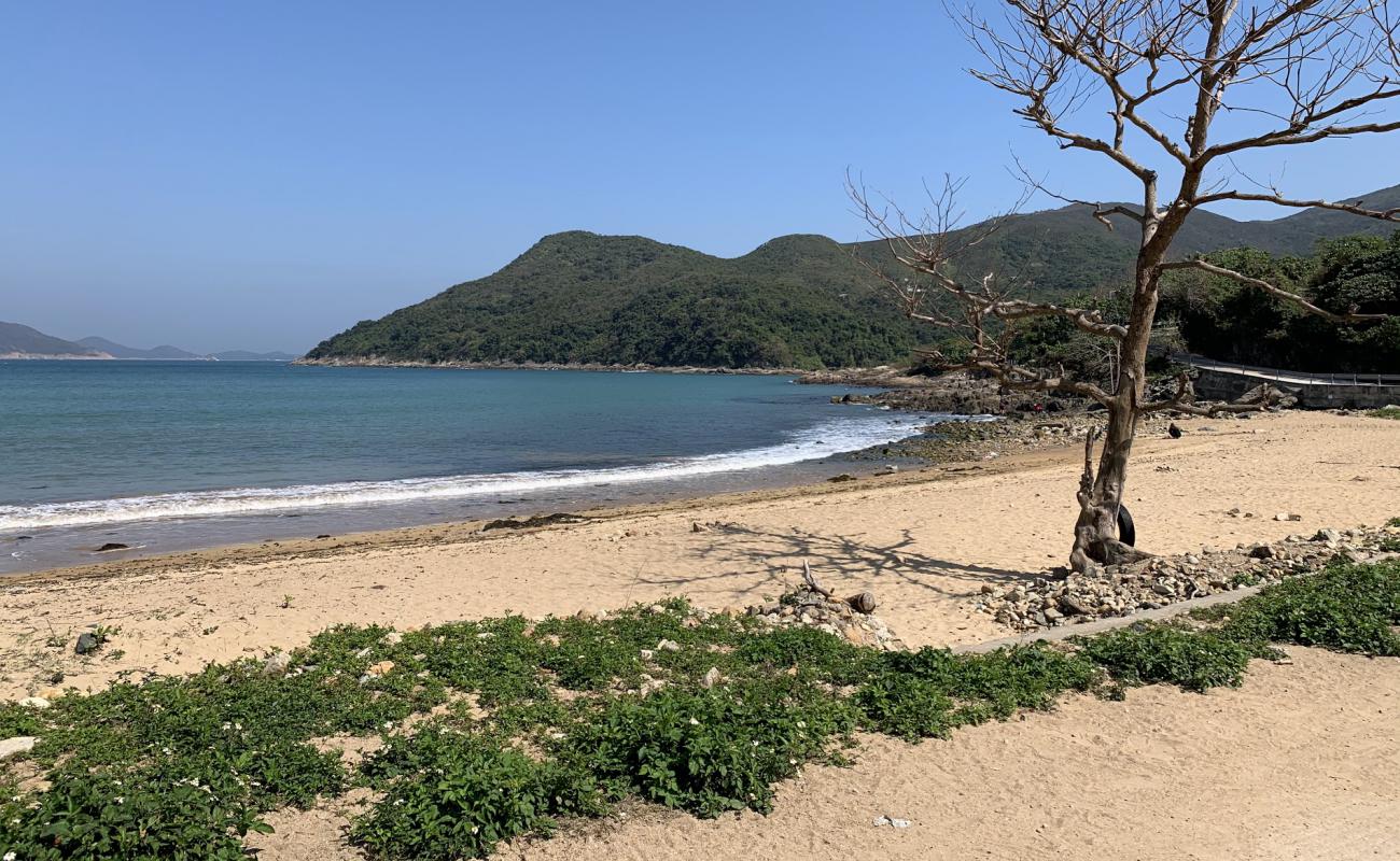 Photo of Sheung Sze Wan Beach with bright sand & rocks surface