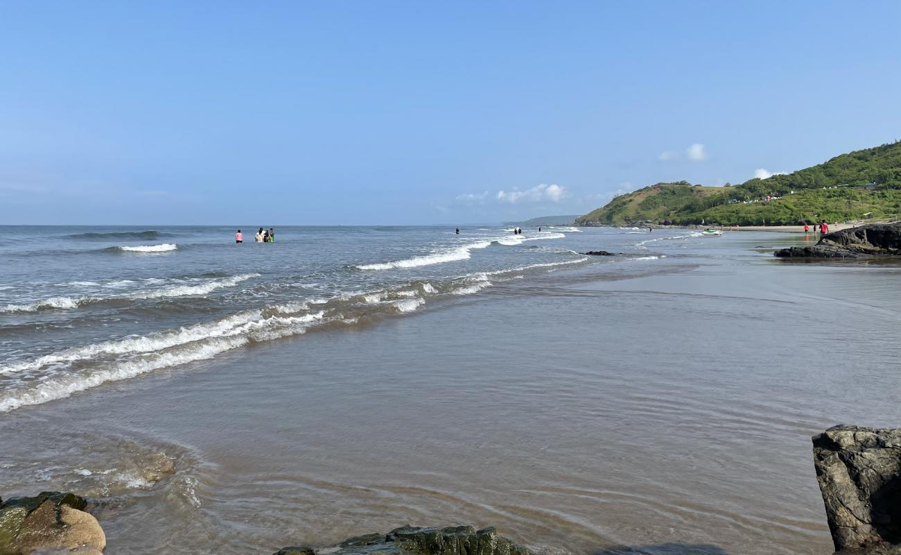 Photo of Vagator Beach with bright sand surface