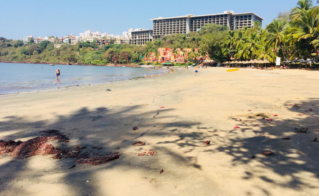 Photo of Vainguinim Beach with bright sand surface