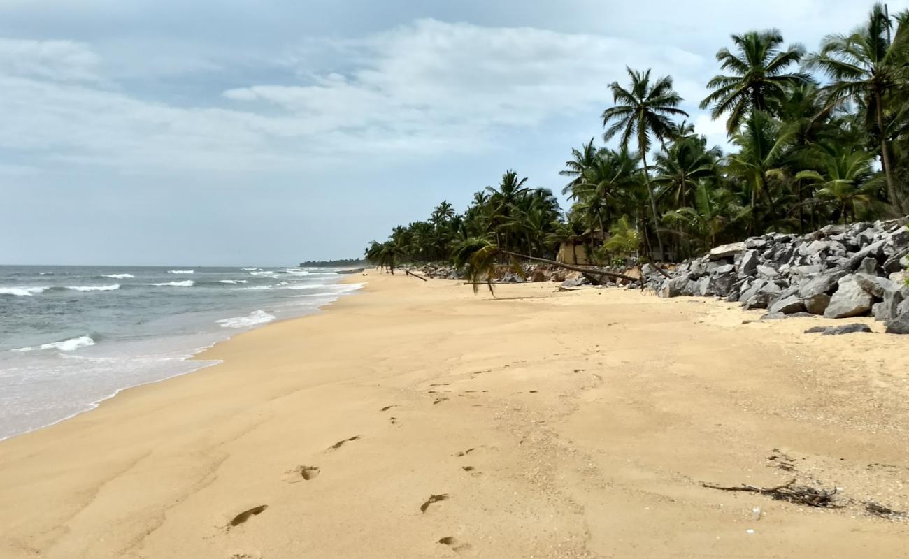 Photo of Uchila Beach with bright sand surface