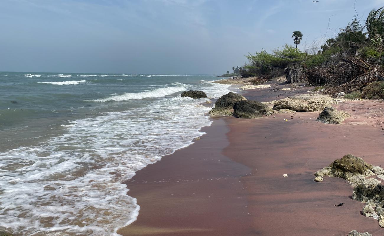 Photo of Coral Casita Beach with bright sand & rocks surface