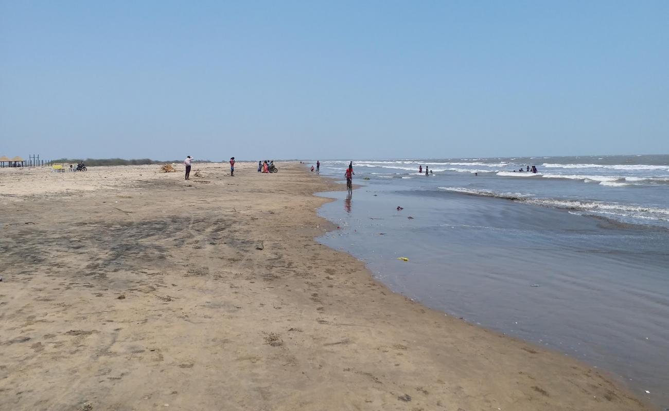 Photo of Dindi Beach with gray sand surface