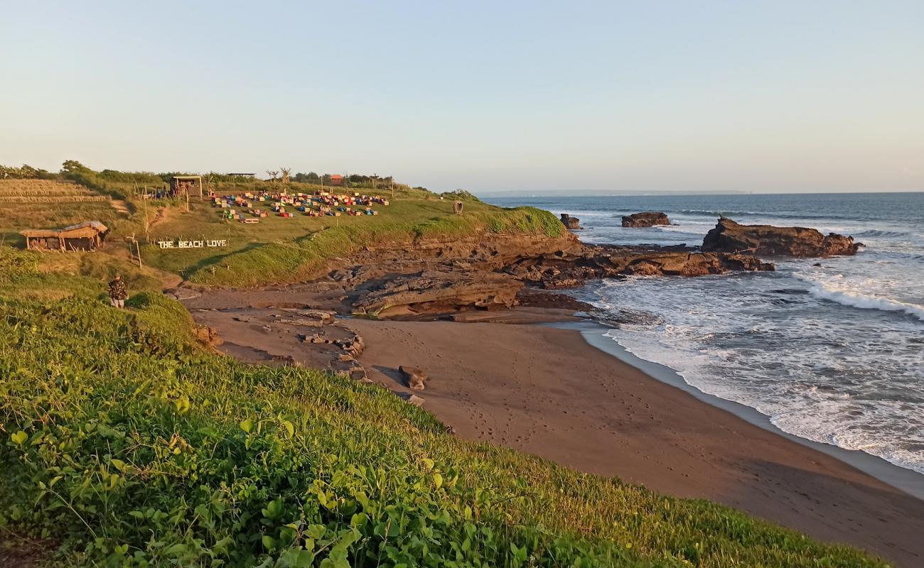 Photo of Panggungan Beach with black sand surface