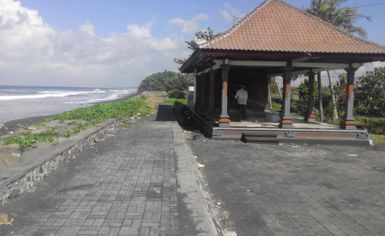 Photo of Tumbles Beach with brown sand surface