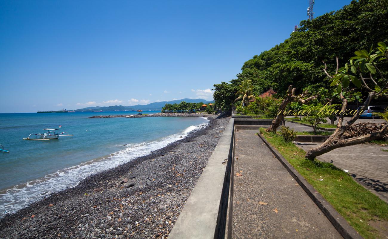 Photo of Candidasa Beach with light sand &  pebble surface