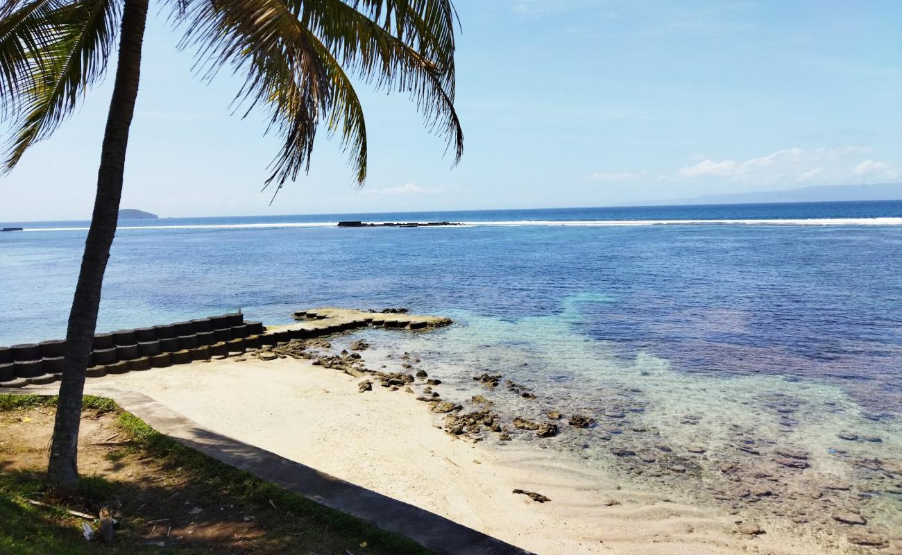 Photo of Nyuh Ivory Beach with bright sand & rocks surface