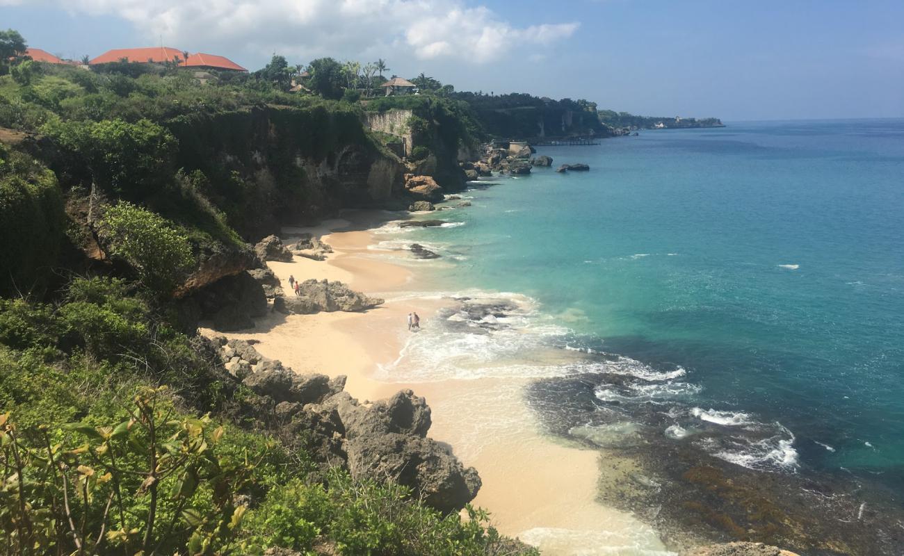 Photo of Kaneko Beach with bright sand & rocks surface