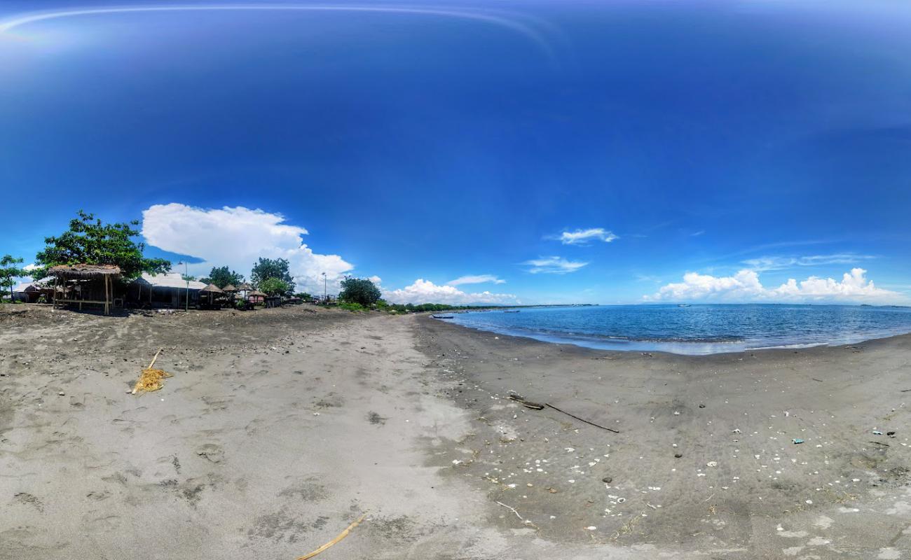 Photo of Muara Lungkak Beach with brown sand surface