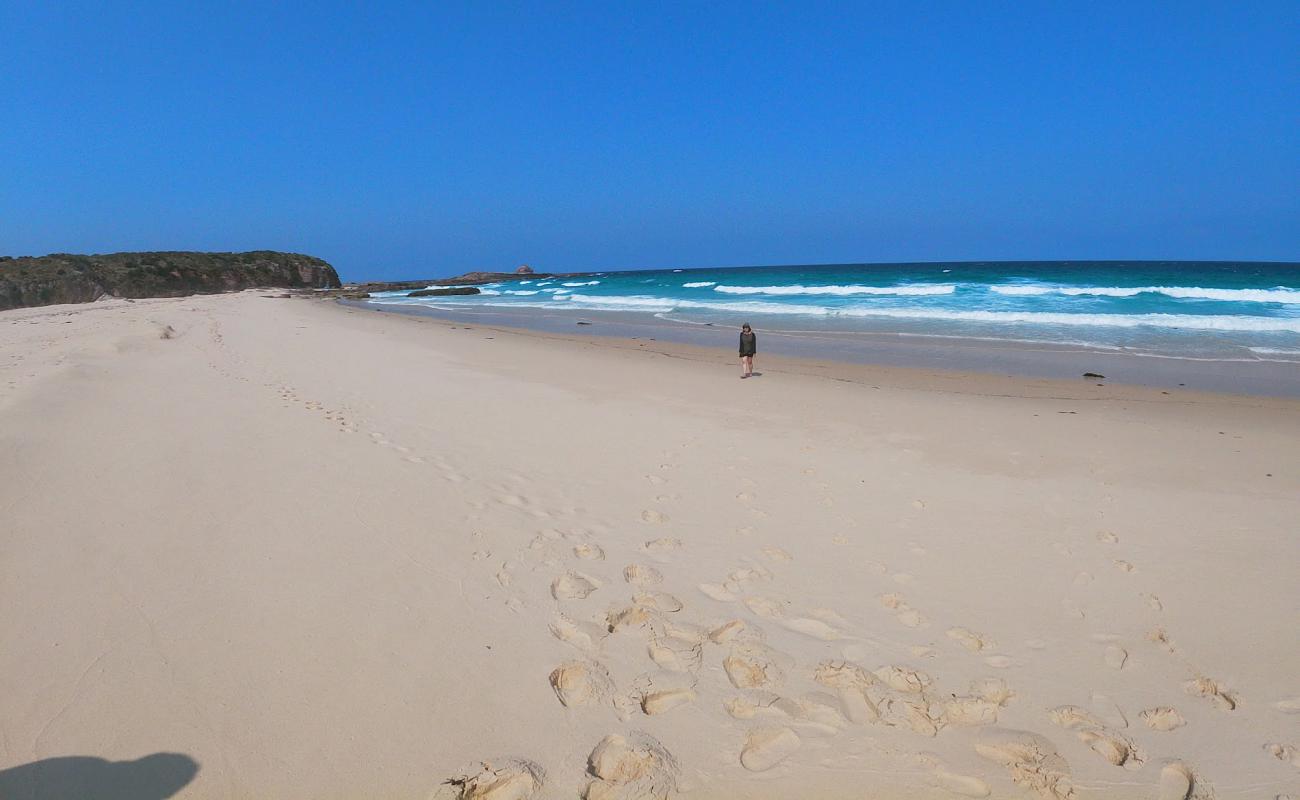 Photo of Haycock Beach with bright sand surface