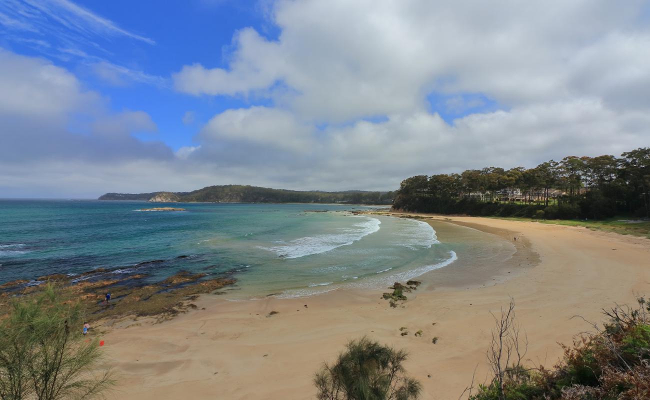 Photo of Denhams Beach with bright sand surface