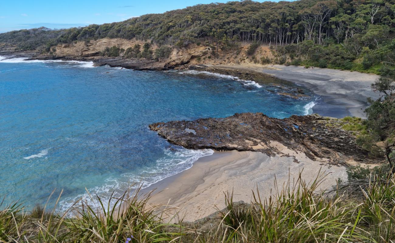 Photo of Dark Beach with gray fine pebble surface