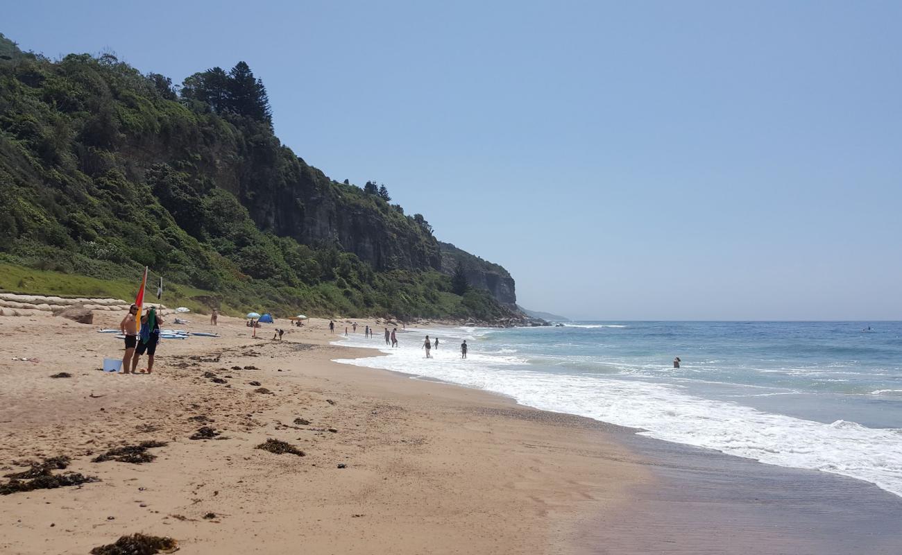 Photo of Coalcliff Beach with brown sand surface