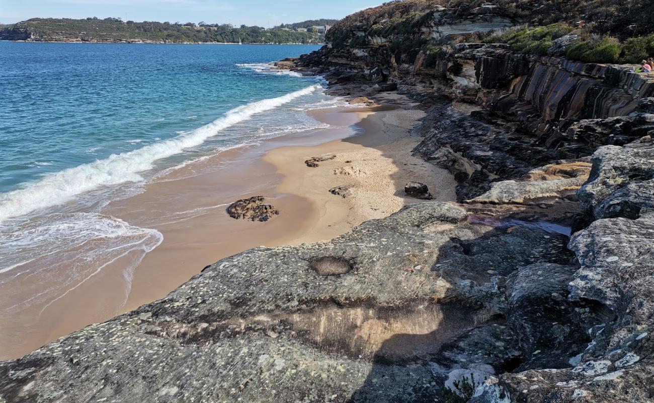 Photo of Washaway Beach with bright fine sand surface