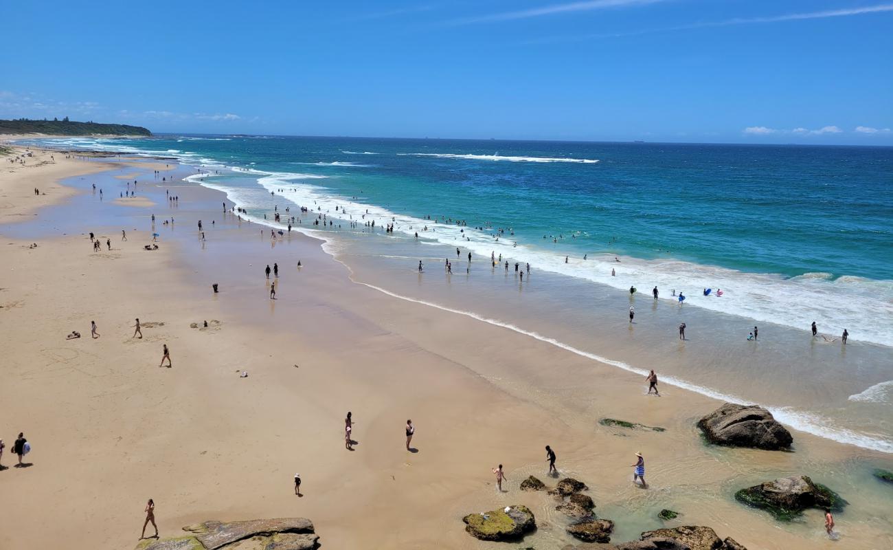 Photo of Caves Beach with bright sand surface