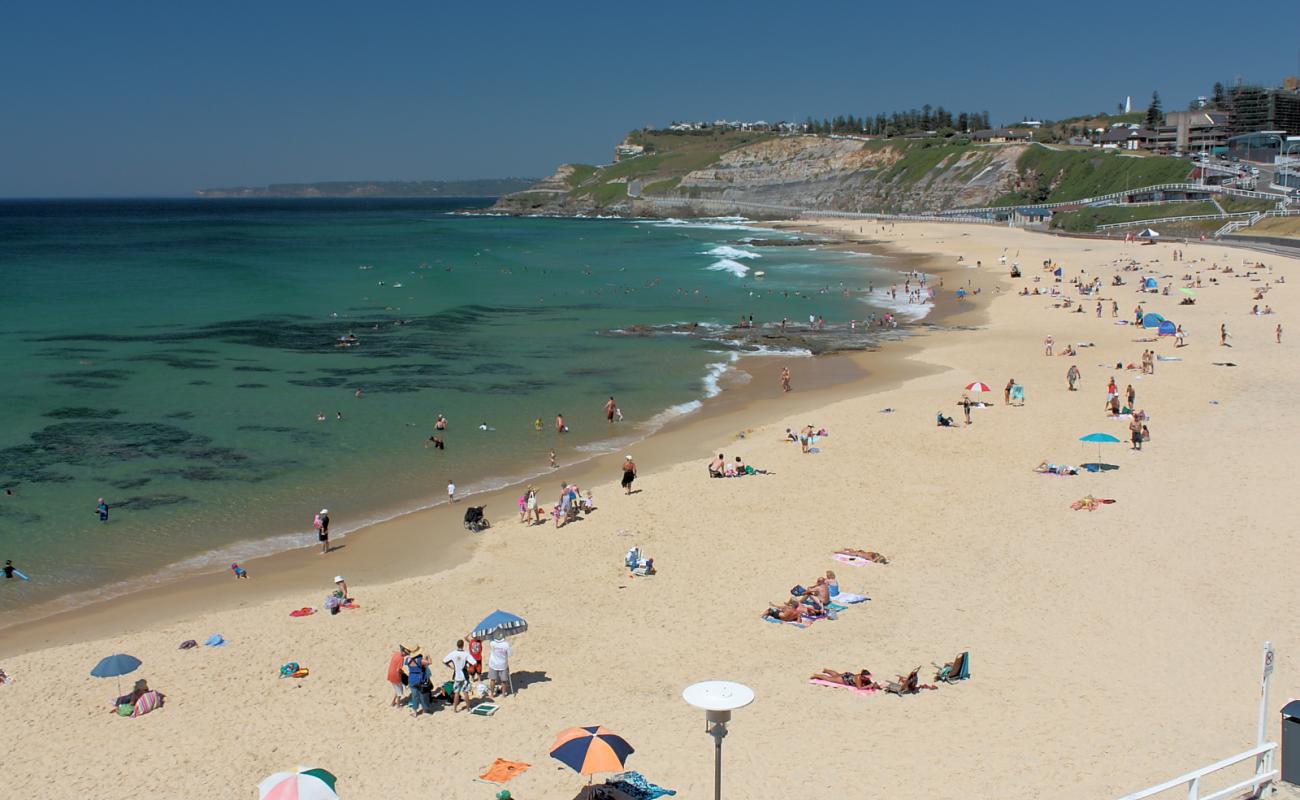 Photo of Newcastle Beach with bright sand surface