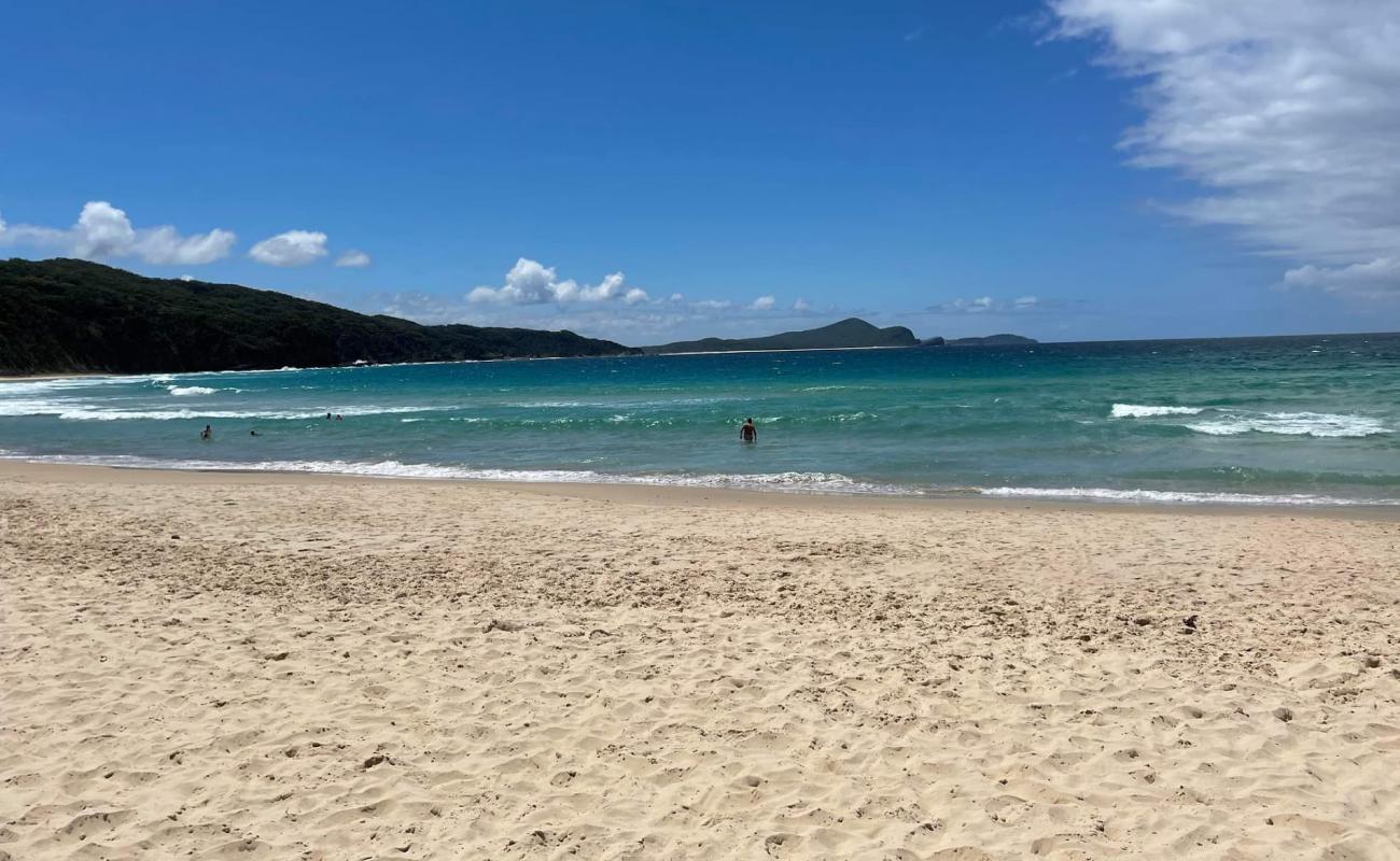 Photo of Treachery Beach with bright fine sand surface