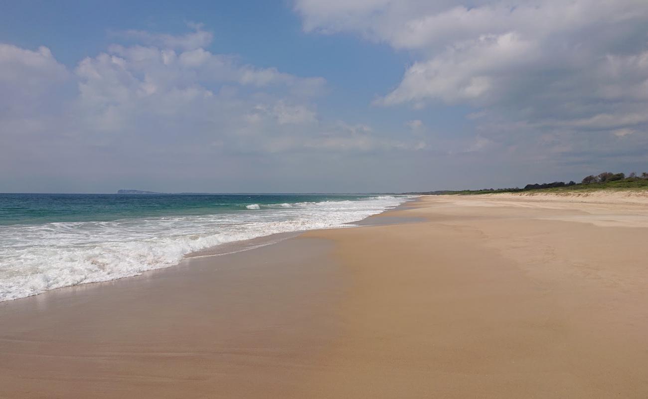 Photo of Kylies Beach with bright fine sand surface