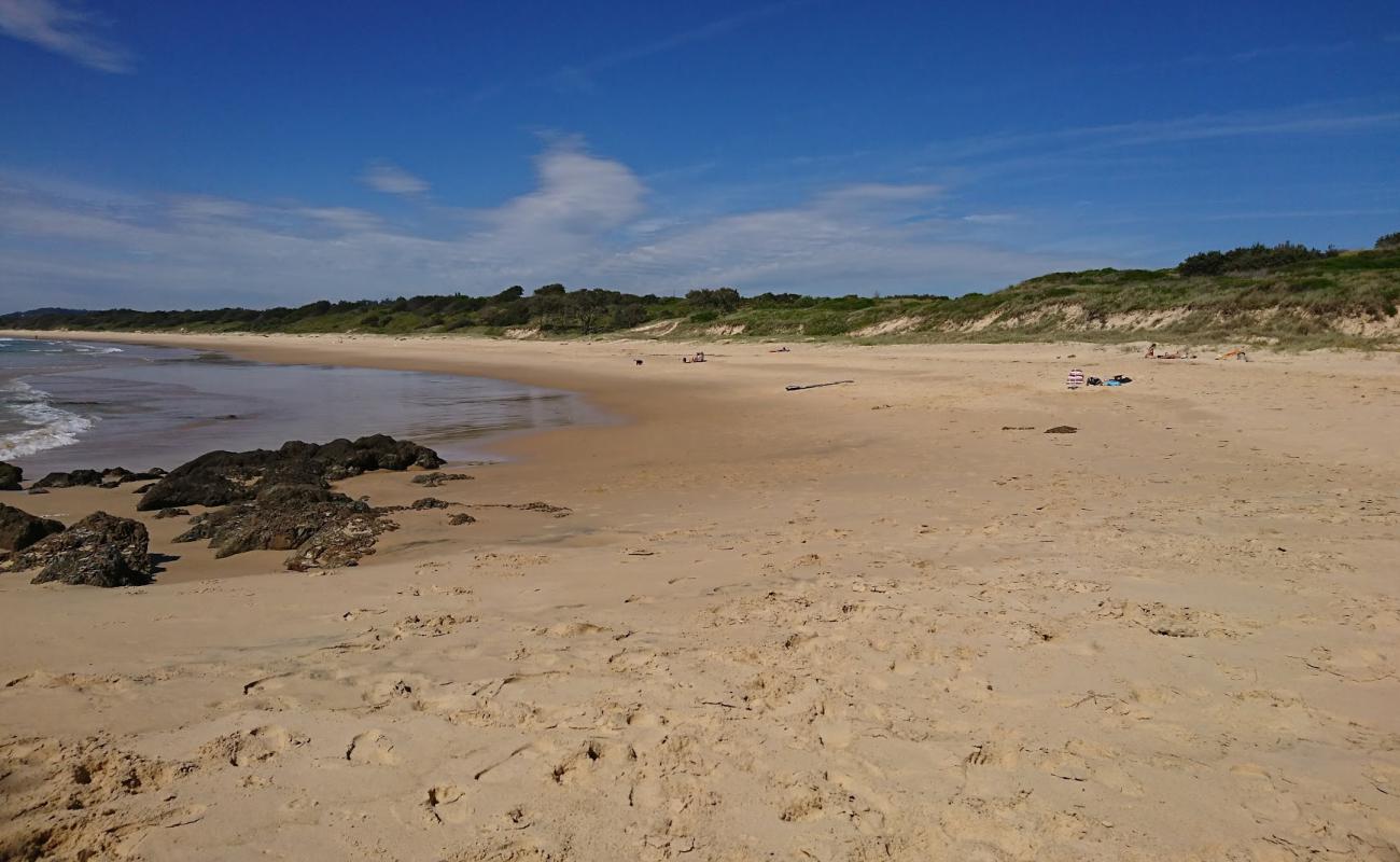 Photo of Woolgoolga Back Beach with bright fine sand surface