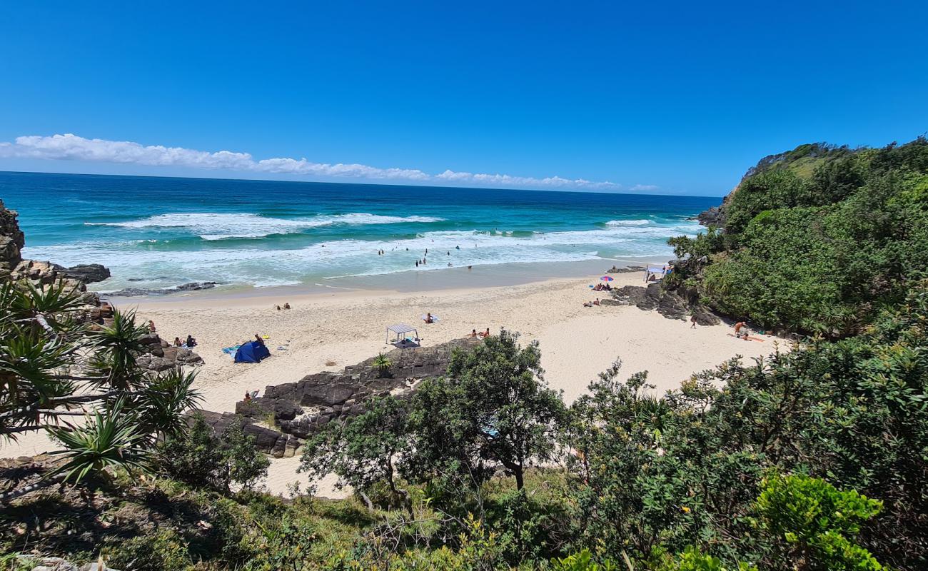 Photo of Whites Beach with bright fine sand surface