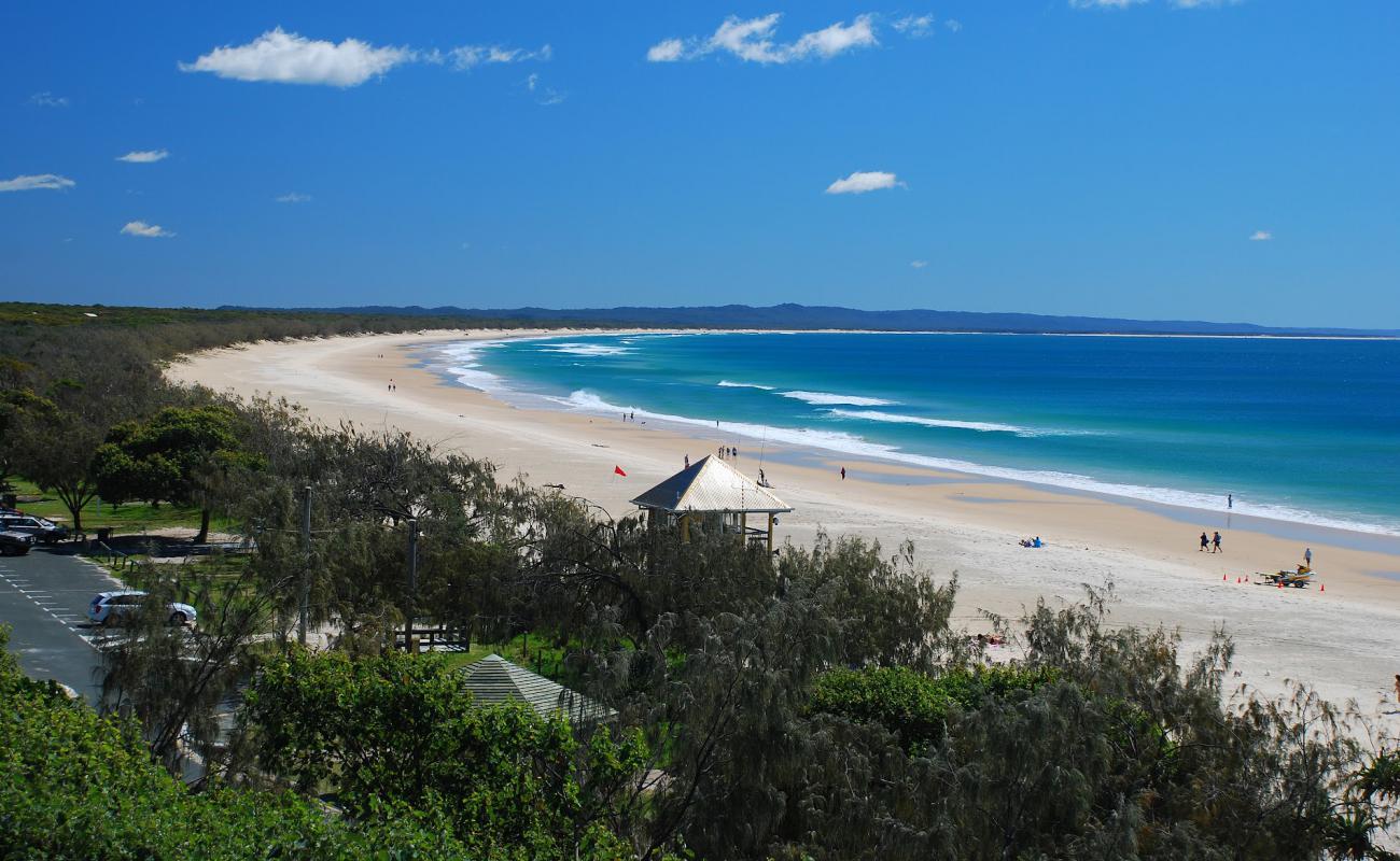 Photo of Rainbow Beach with bright fine sand surface