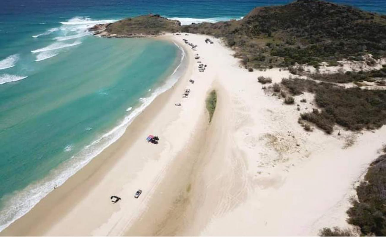 Photo of Orchid Beach with bright fine sand surface