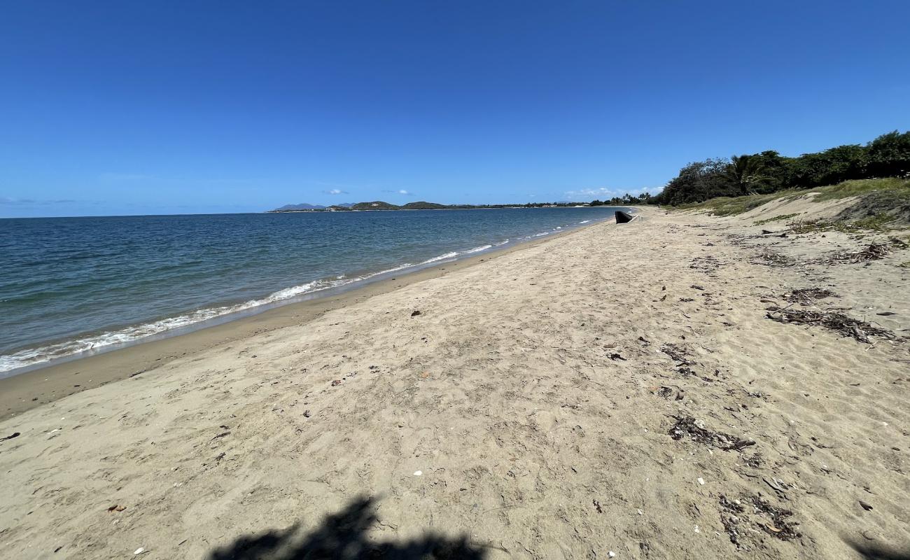 Photo of Queens Beach with bright sand surface