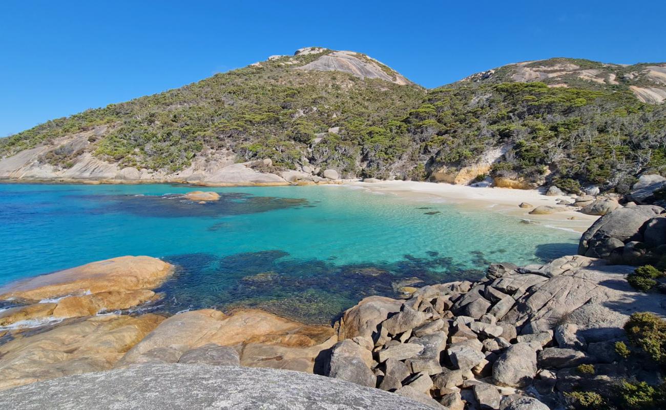 Photo of Waterfall Beach with white fine sand surface