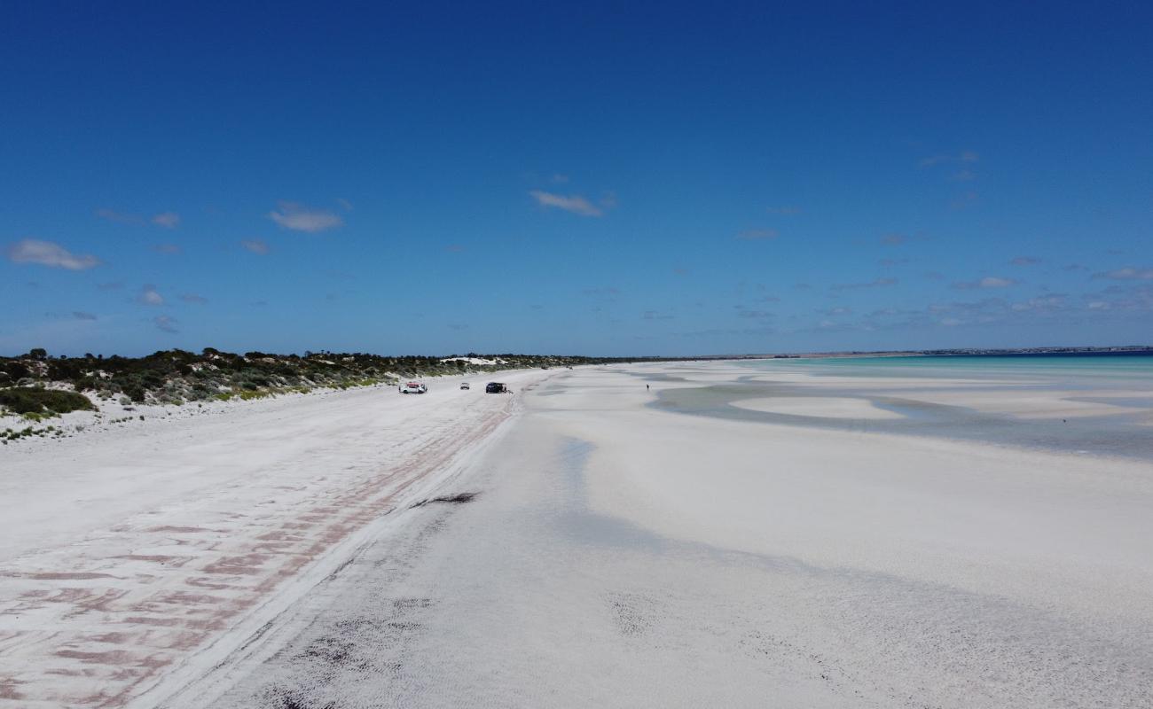 Photo of Longbottom Beach with bright sand surface